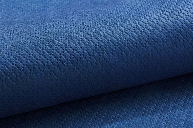 SSS diamond pattern embossed nonwoven in dark blue