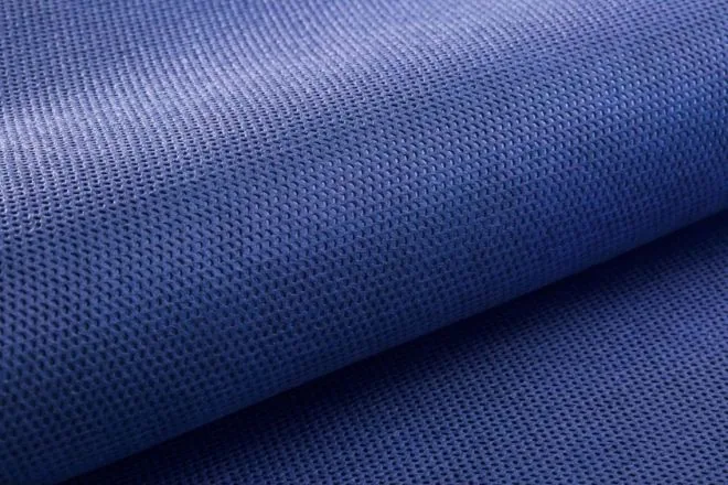 Royal blue spunbond nonwoven fabric surface