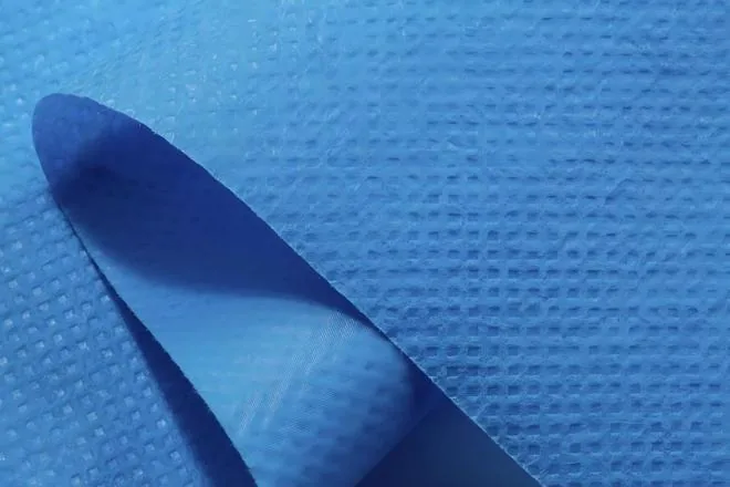 SSS square dot embossed nonwoven in medium blue