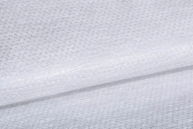 SSS sesame dot embossed nonwoven in white