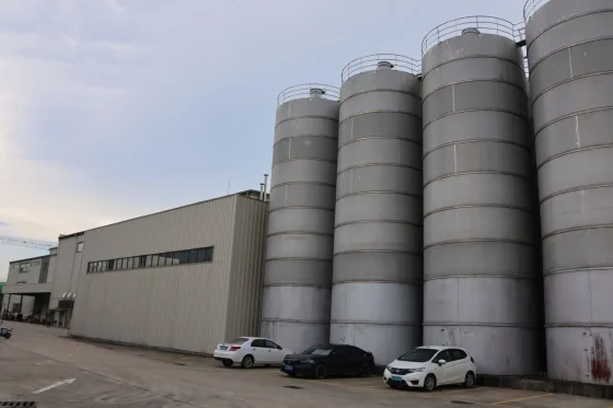Eight 150-ton raw material storage tanks at the YOUTHFUL plant
